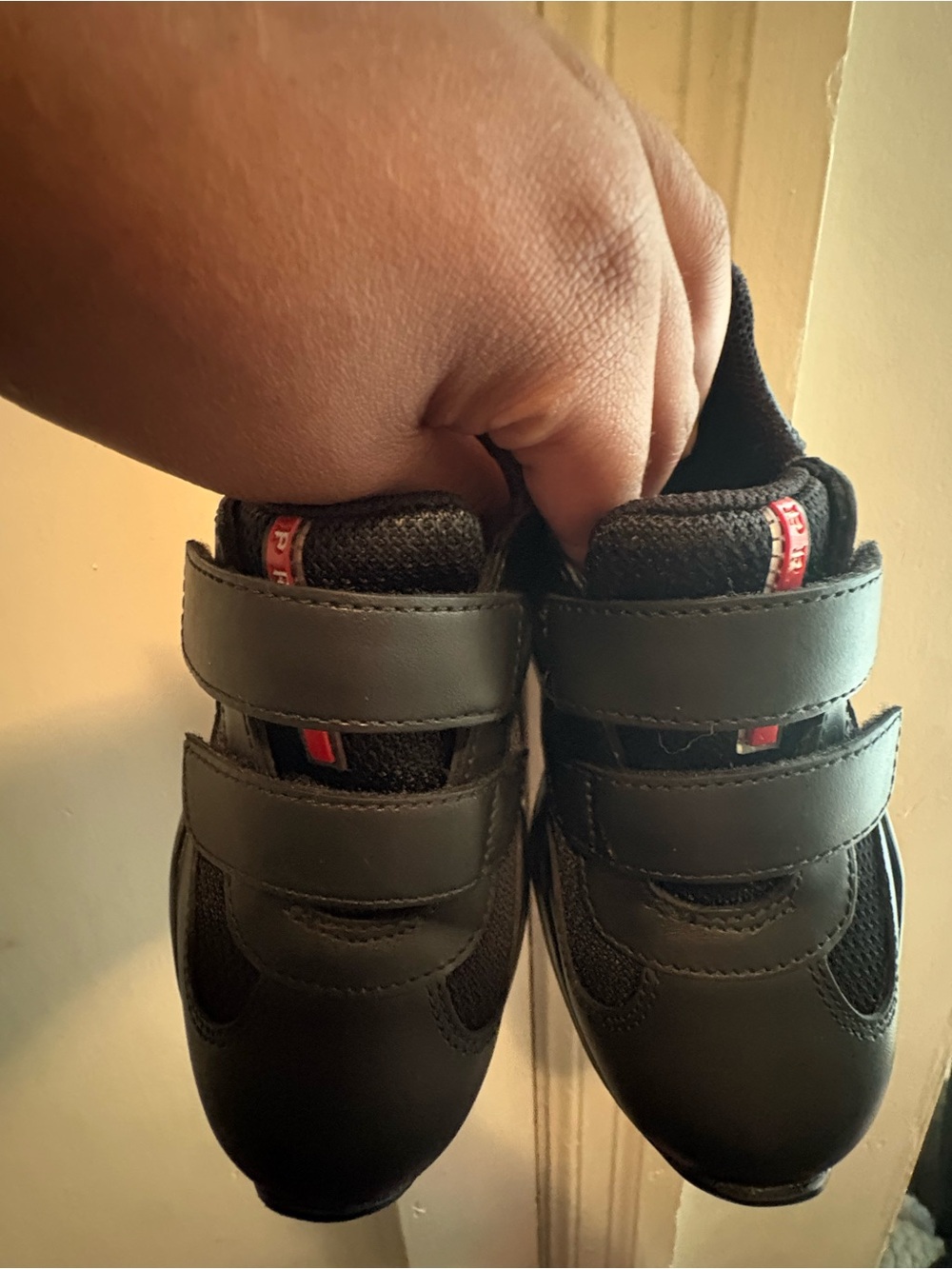 Prada Kids Black Sneakers with Red Accent